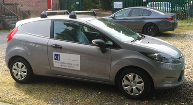 CJ Plastering grey car